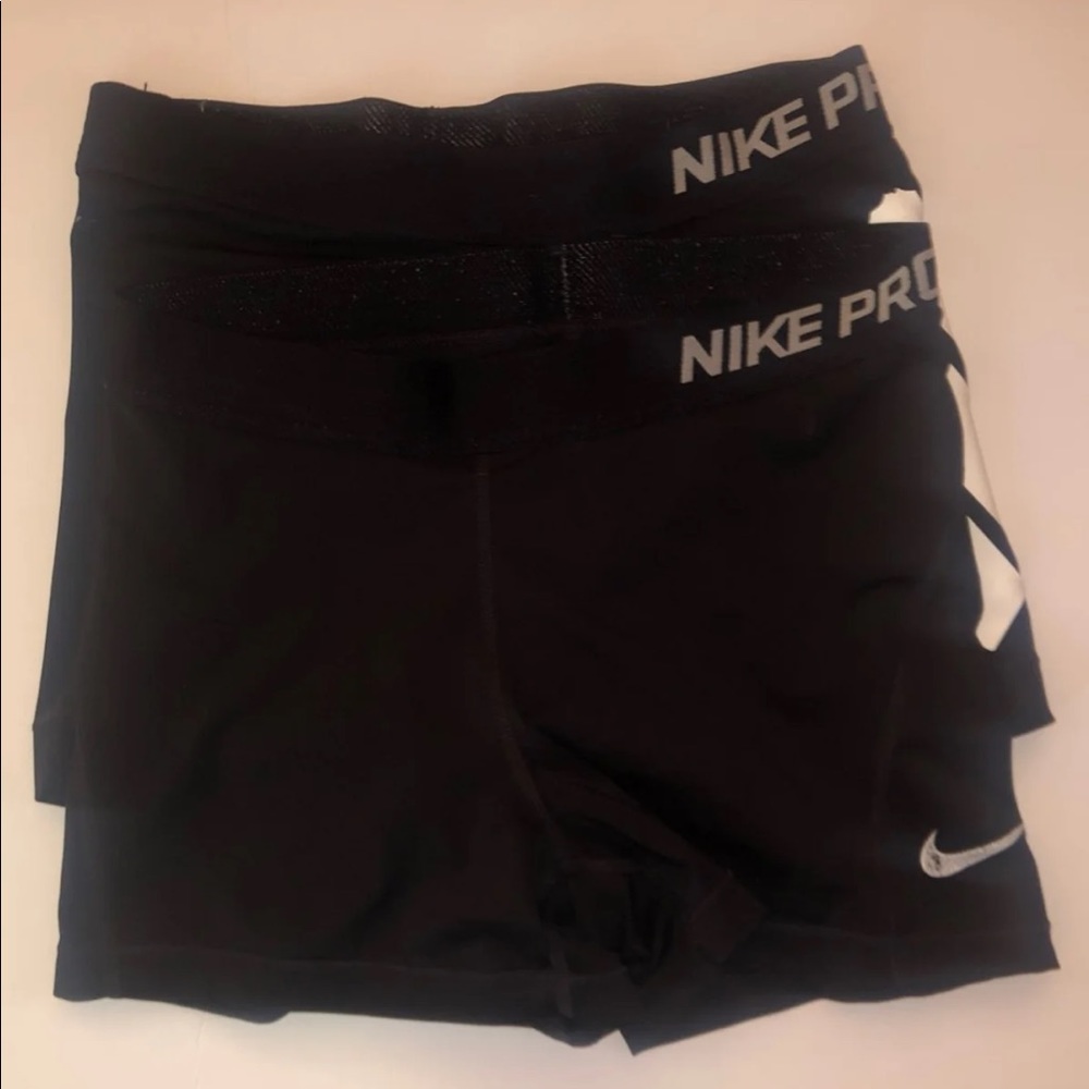 Two pairs of Nike Pro Shorts